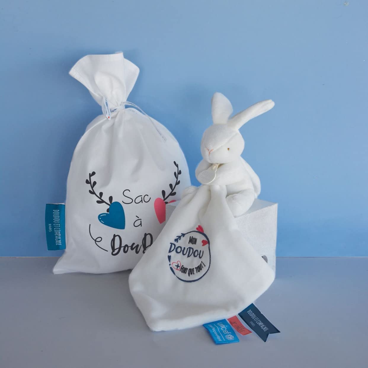 doudou-et-compagnie-sac-doudou-lapin-unicef-blanc-10-cm image 2